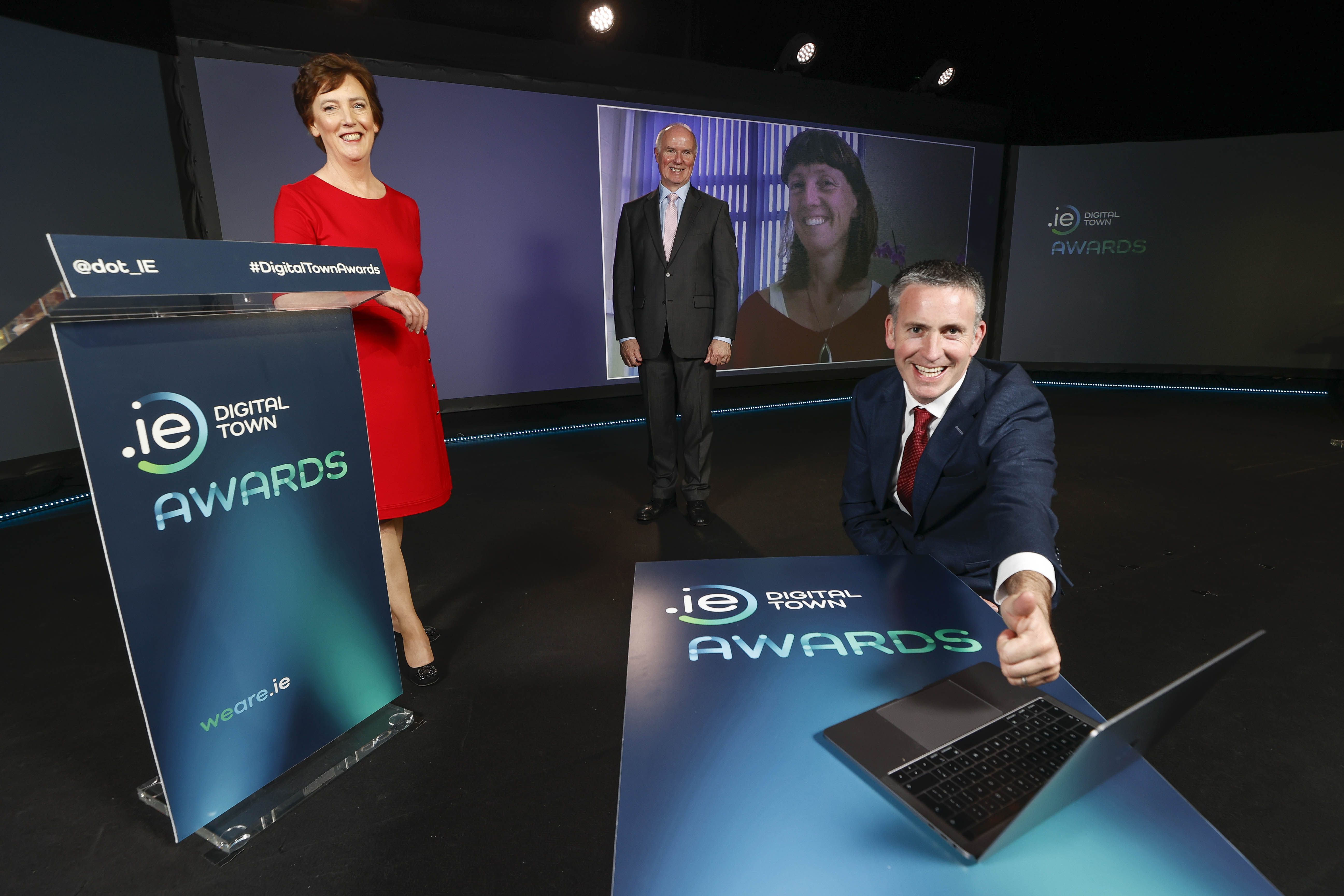 Pictured (l-r) presenting the overall winner Maggie Breen from the Dingle Peninsula in Co Kerry at the inaugural .IE Digital Town Awards 2021 were Oonagh McCutcheon, Corporate Communications Manager, .IE, David Curtin, Chief Executive, .IE with Minister Damien English, Minister of State for Business, Employment and Retail at the Department of Enterprise, Trade and Employment.