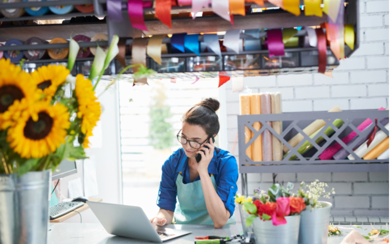 Female business owner on computer